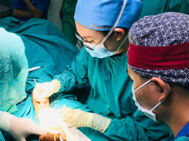 A doctor operating a hand